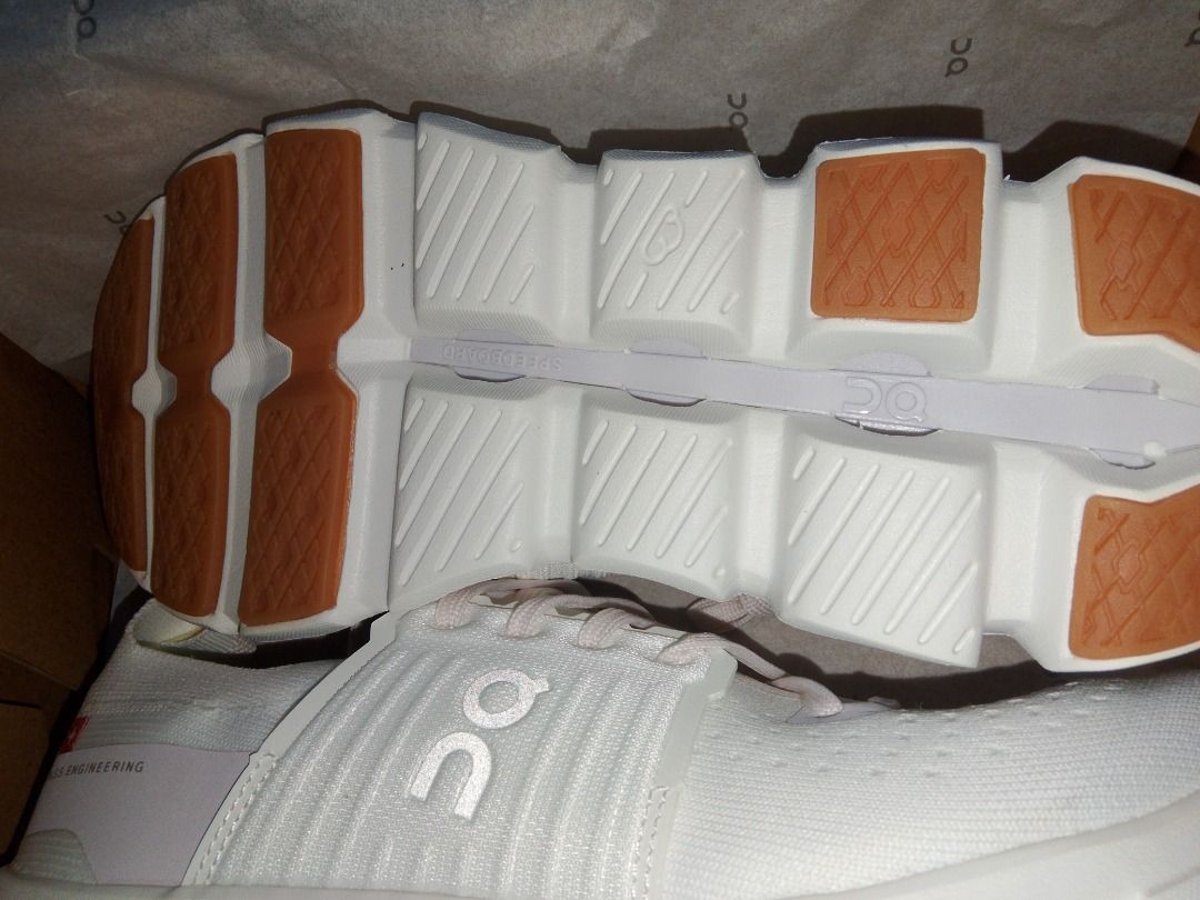 On Cloudmonster White lilly (Category: Sneakers) located in Caloocan City. Submitted by luckyturtle.aa6ccf (Listing ID 1464702655, Image 3). Description: On Cloudmonster running shoes, crisp white knit upper with soft pink laces and accents. Distinctive thick CloudTec sole cushioning. Brown gum rubber traction pads on the outsole. Comes packed in the original branded shoe box with tissue paper. Never worn out..