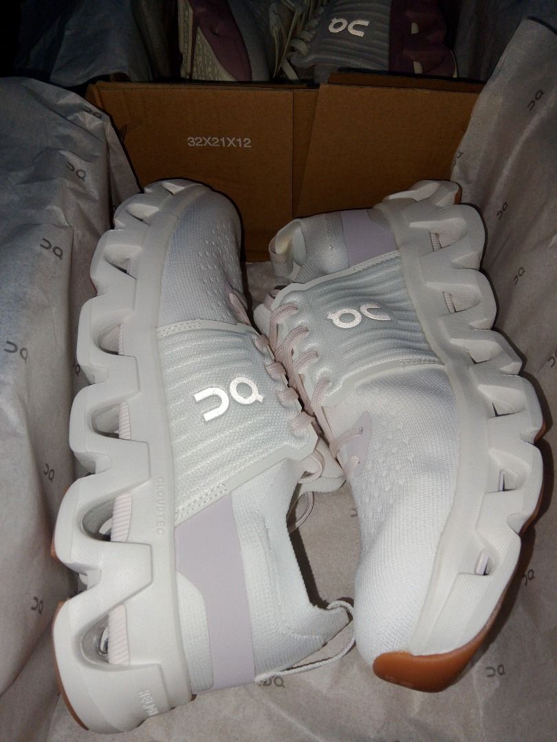On Cloudmonster White lilly (Category: Sneakers) located in Caloocan City. Submitted by luckyturtle.aa6ccf (Listing ID 1464702655, Image 1). Description: On Cloudmonster running shoes, crisp white knit upper with soft pink laces and accents. Distinctive thick CloudTec sole cushioning. Brown gum rubber traction pads on the outsole. Comes packed in the original branded shoe box with tissue paper. Never worn out..