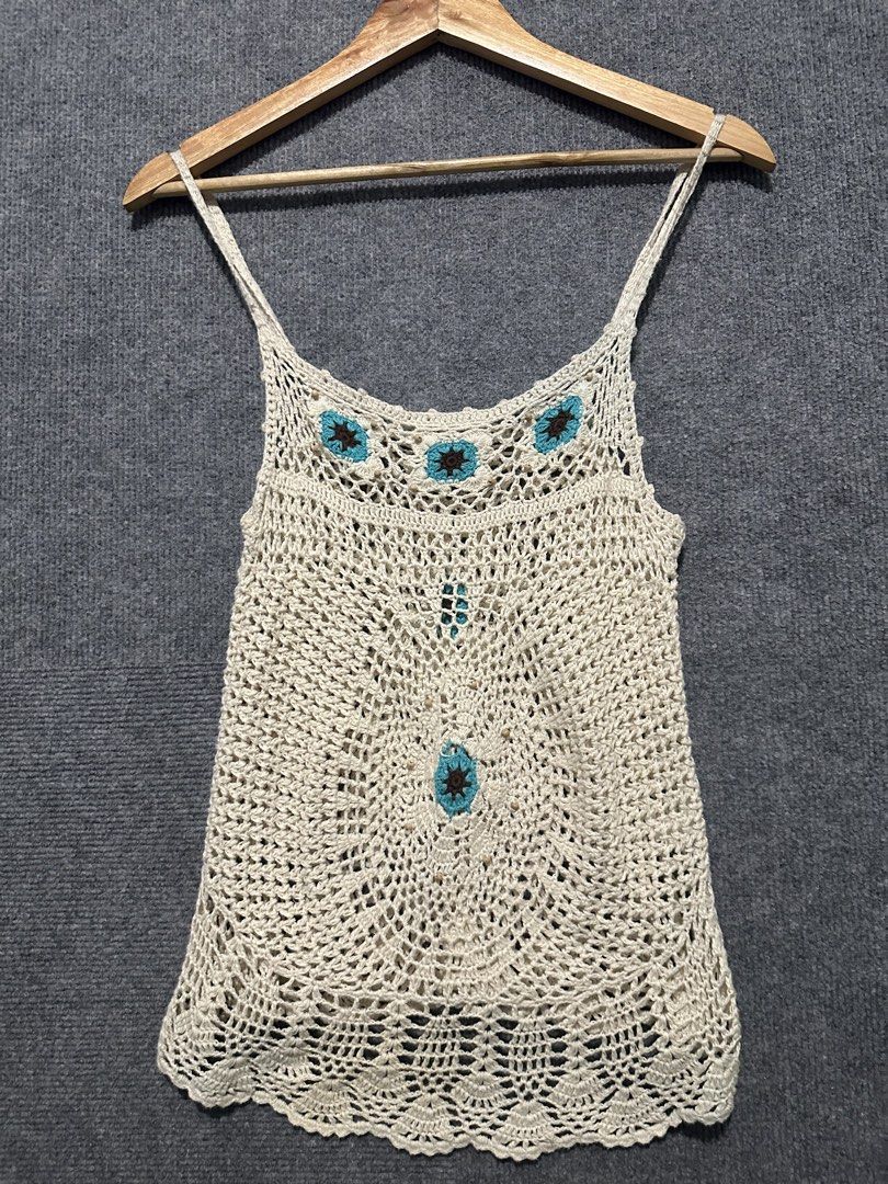 One Step Up Crochet Tank Top Size L (Category: Sleeveless) located in Villasis. Submitted by justinramosonfb (Listing ID 1464711902, Image 1). Description: - Brand: One Step Up - Size: L - Material: 55% ramie, 45% cotton - Color: Cream with turquoise and brown floral crochet accents - Details: Cute wooden beads near neckline - Fit: Lightweight, breezy, and great for layering in warm weather.