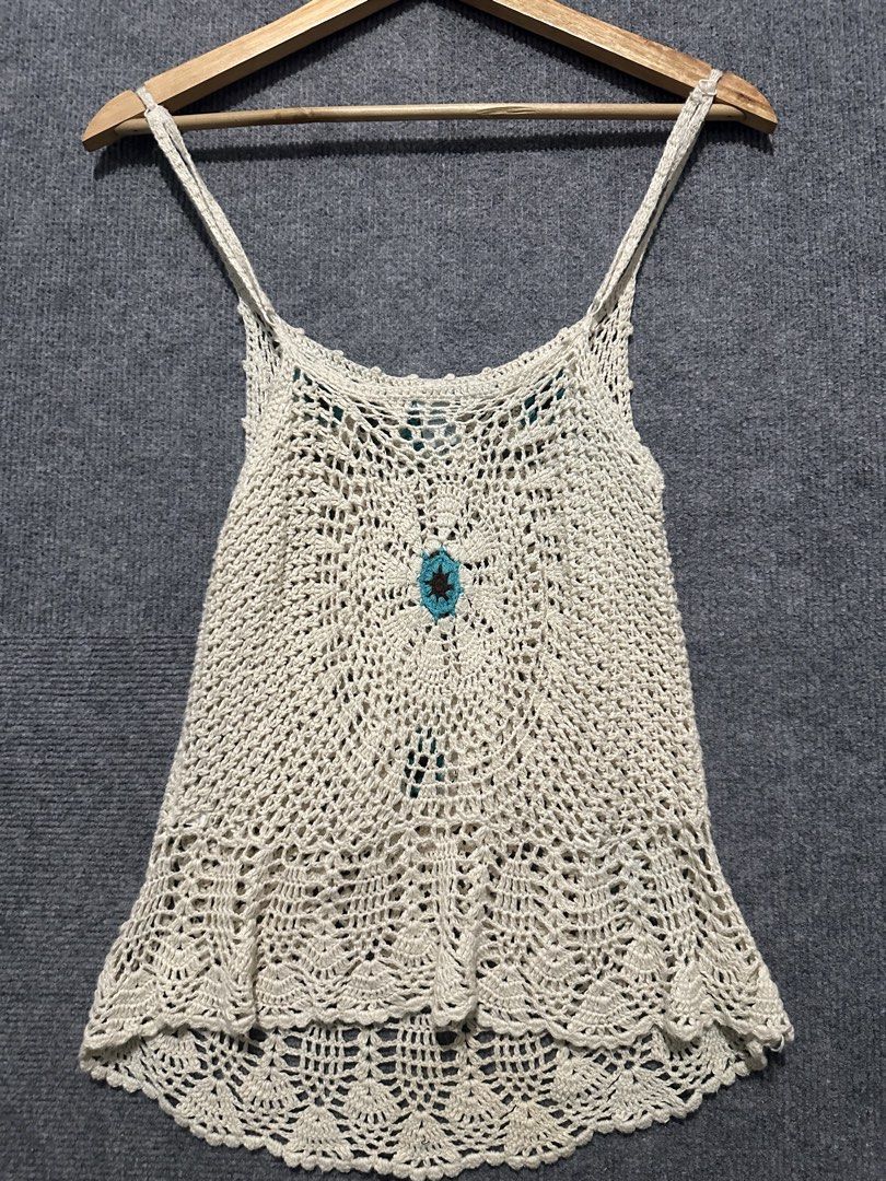 One Step Up Crochet Tank Top Size L (Category: Sleeveless) located in Villasis. Submitted by justinramosonfb (Listing ID 1464711902, Image 2). Description: - Brand: One Step Up - Size: L - Material: 55% ramie, 45% cotton - Color: Cream with turquoise and brown floral crochet accents - Details: Cute wooden beads near neckline - Fit: Lightweight, breezy, and great for layering in warm weather.