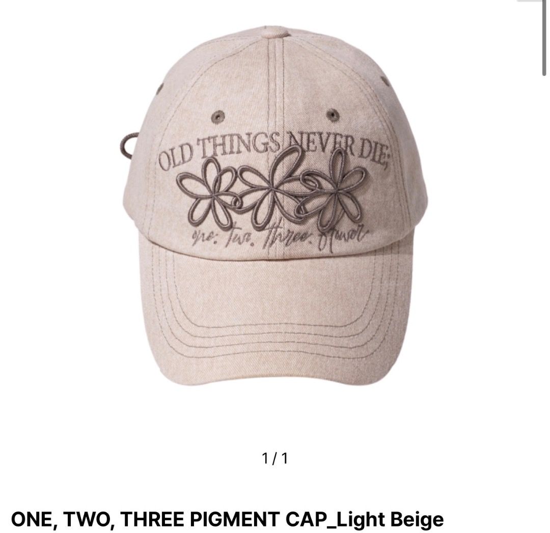 ONGO - ONE TWO THREE Pigment Cap Light Beige (Category: Hats & Beanies) located in Las Pinas. Submitted by stroberriii (Listing ID 1464626067, Image 1). Description: - Never used - Bought from KR - Light beige cap - Embroidered flowers and text: 'OLD THINGS NEVER - Additional embroidery: 'one, two, three, flower' - Adjustable strap at the back with flower detail - Ideal for casual wear.