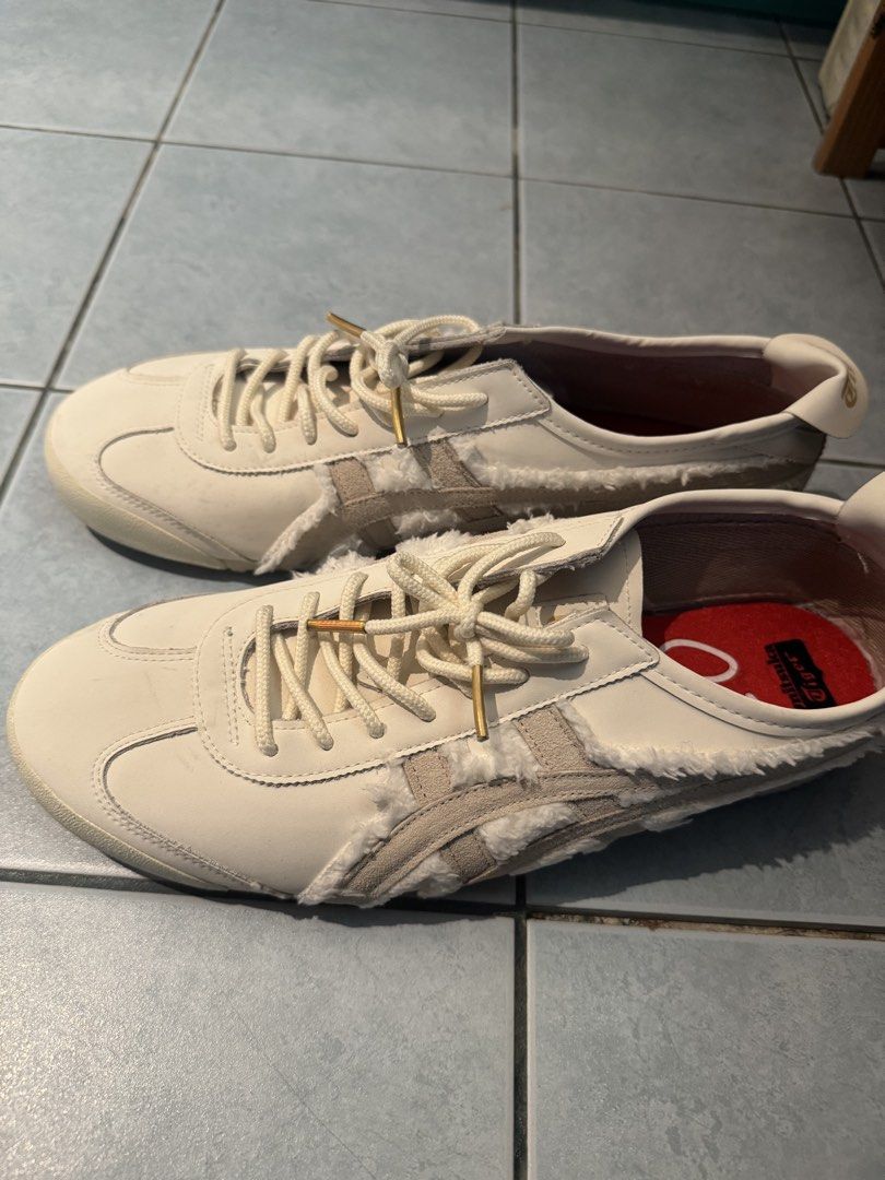 Onitsuka Tiger Mexico 66 (Category: Casual Shoes) located in Muntinlupa City. Submitted by yungbruh66 (Listing ID 1464689489, Image 1). Description: - Brand: Onitsuka Tiger Mexico 66 - Colorway: Cream/Off-White with red insoles (Size 23) - Unique Details: Furry shearling side stripes and heel tab - Premium Accents: Thick rope laces with gold metal aglets, gold foil logo on tongue and heel pull - Condition: Worn a few times, minimal creasing near 