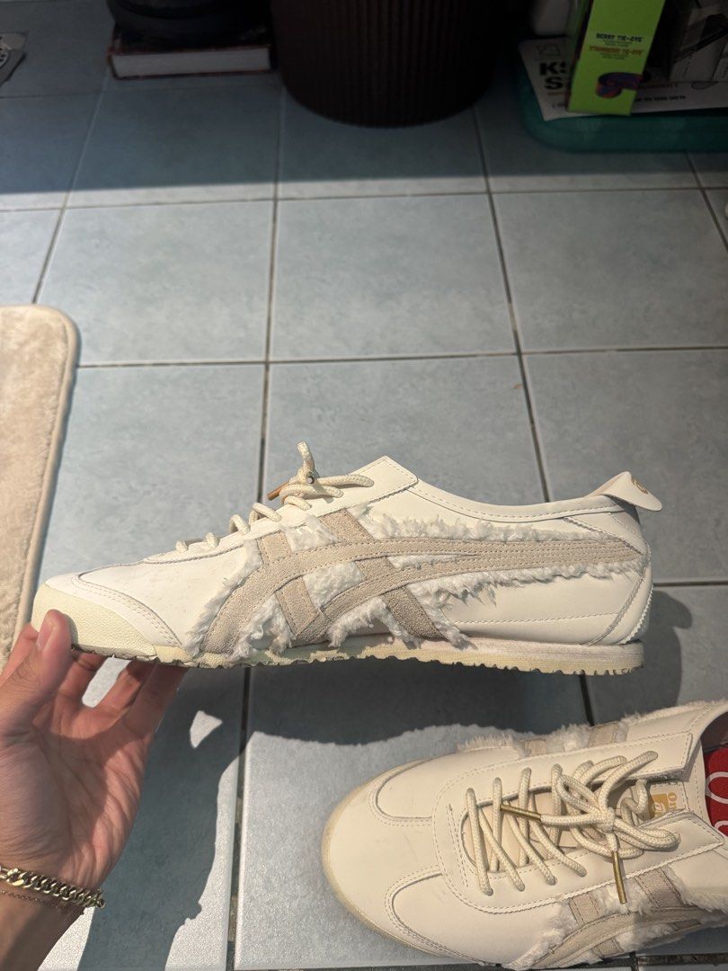 Onitsuka Tiger Mexico 66 (Category: Casual Shoes) located in Muntinlupa City. Submitted by yungbruh66 (Listing ID 1464689489, Image 3). Description: - Brand: Onitsuka Tiger Mexico 66 - Colorway: Cream/Off-White with red insoles (Size 23) - Unique Details: Furry shearling side stripes and heel tab - Premium Accents: Thick rope laces with gold metal aglets, gold foil logo on tongue and heel pull - Condition: Worn a few times, minimal creasing near 
