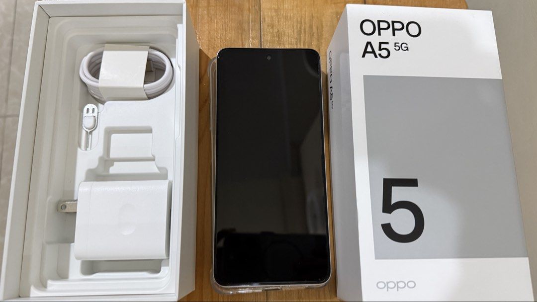 Oppo A5 5G (Category: OPPO) located in Manila. Submitted by ms.trust (Listing ID 1464669675, Image 1). Description: - Brand new Oppo A5 5G - 128GB internal storage - Includes charger and cable - Supports 5G connectivity No issue Mode of Payment: Gcash/BPI Loc: 6th ave. Caloocan City (near SM Grand Central) Pm me.