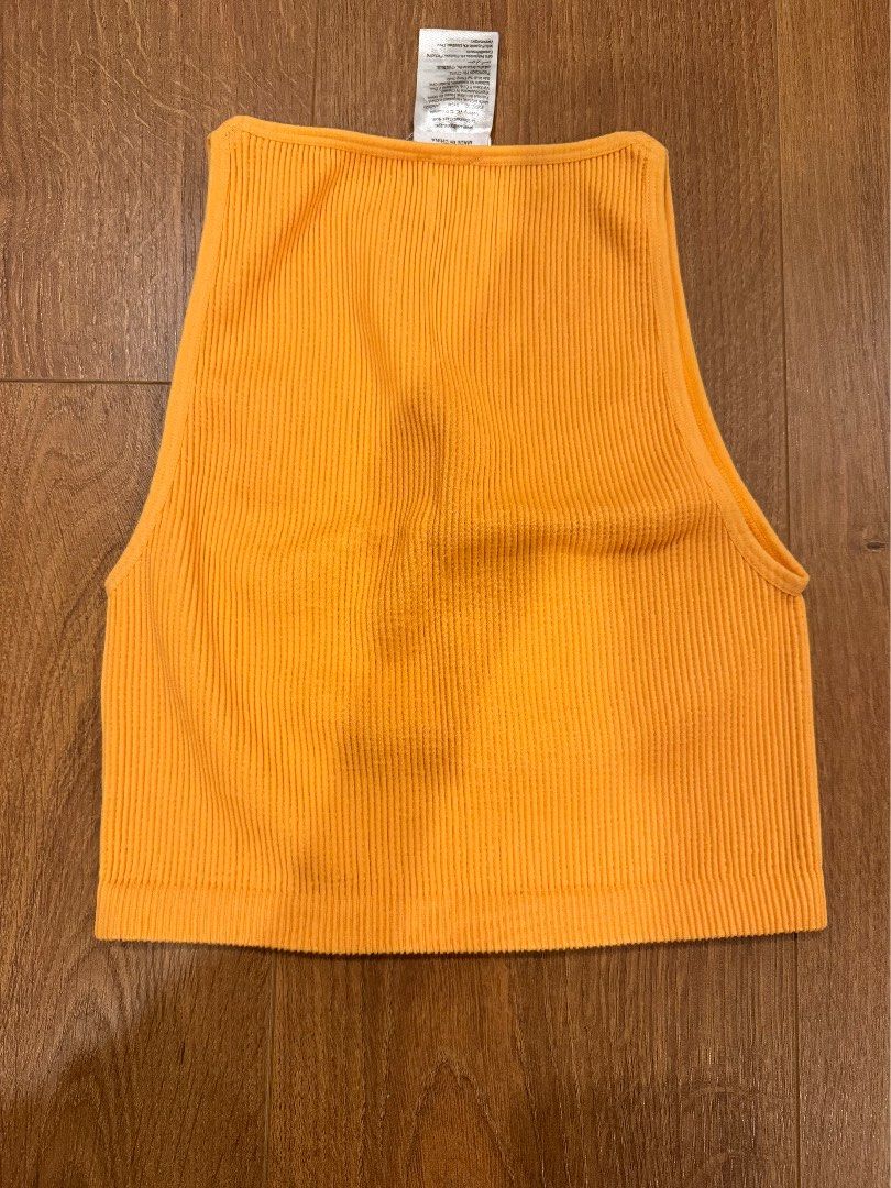 Orange top (Category: Sleeveless) located in Paranaque City. Submitted by bbyooodaa (Listing ID 1464637905, Image 2). Description: Super cute!! .