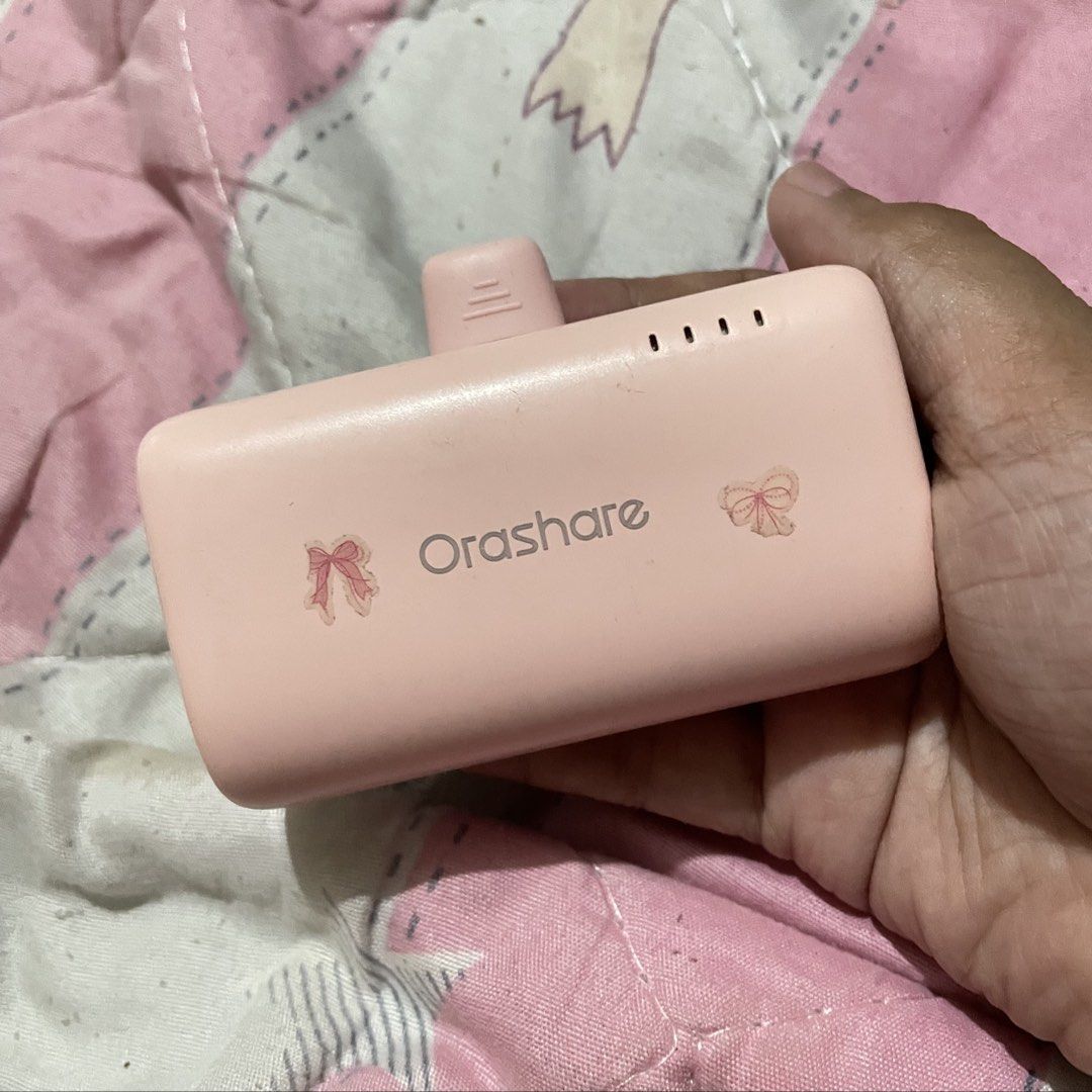 Orashare Pink Portable Charger (IOS ONLY) (Category: Chargers & Cables) located in Cainta. Submitted by hayiyimaw (Listing ID 1463438229, Image 1). Description: - Adorable pink Orashare portable charger - Battery level indicator lights for easy monitoring - Compact and travel-friendly - Ideal for charging your devices anywhere, anytime - No issue - For ios only - 10000mah ₱500 fixed Location, Cainta Rizal.