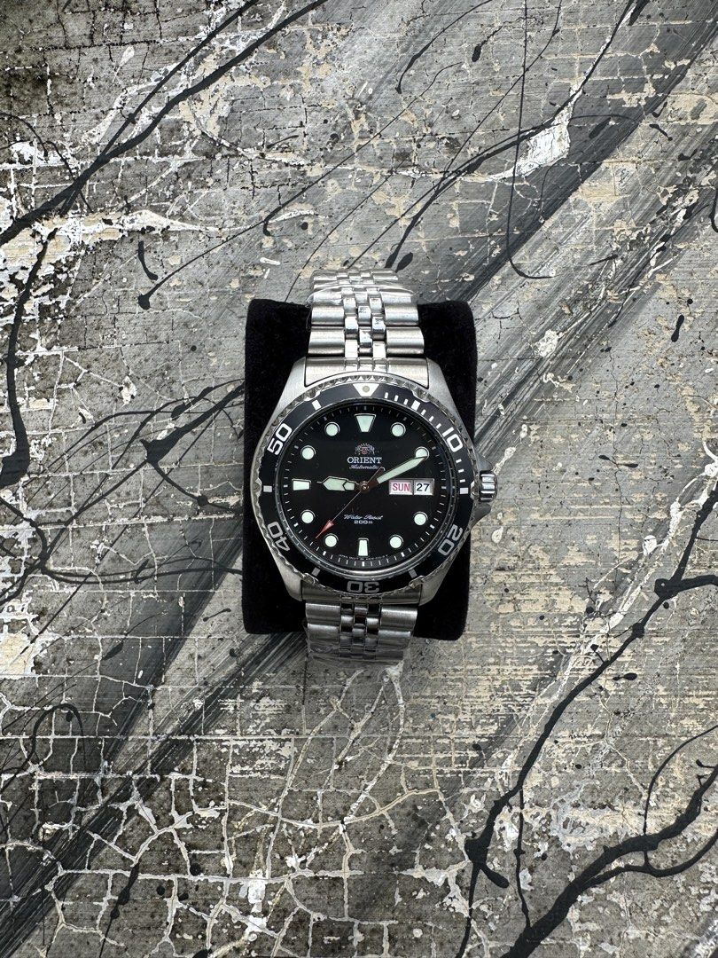 Orient Ray II " FAA02004B9" (Category: Men's Watches) located in Manila. Submitted by alenlibuna34716 (Listing ID 1464643136, Image 1). Description: Orient Ray II " FAA02004B9" Price: 7500 only (nego for sure buyer) Details & Specs: • 42mm • Automatic Movement • Brand Jubilee Strap • Complete box and Card • Day & Date Function •Rotating Bezel •Timegrapher Tested •9/10 Ready to wear Shipping: J&T / LBC (COD or COP) available Location Tarlac City a