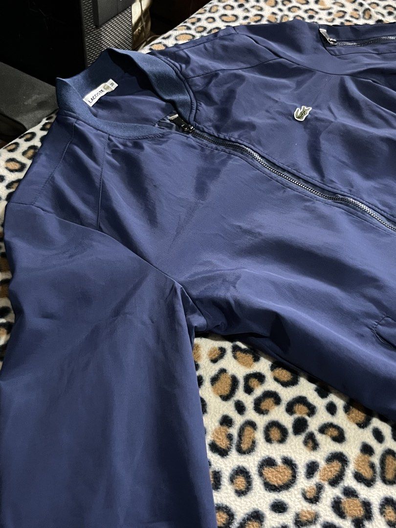 ORIGINAL LACOSTE NAVY BLUE JACKET (Category: Coats, Jackets and Outerwear) located in San Pedro. Submitted by sie_declutters (Listing ID 1464672305, Image 3). Description: Conditions/Issue: - Good as new - Na-gupit na yung wash tag RFS: - Haven’t been used for years .
