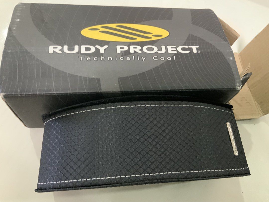 Original Rudy Project Sunglasses with Extra Lenses and Case (Category: Sunglasses & Eyewear) located in San Fernando. Submitted by destinydeals04 (Listing ID 1464571902, Image 2). Description: - Rudy Project Sunglasses - Includes original box and protective case - Comes with two sets of lenses - Ideal for sports and outdoor activities - Features a technically cool design Still can negotiate.