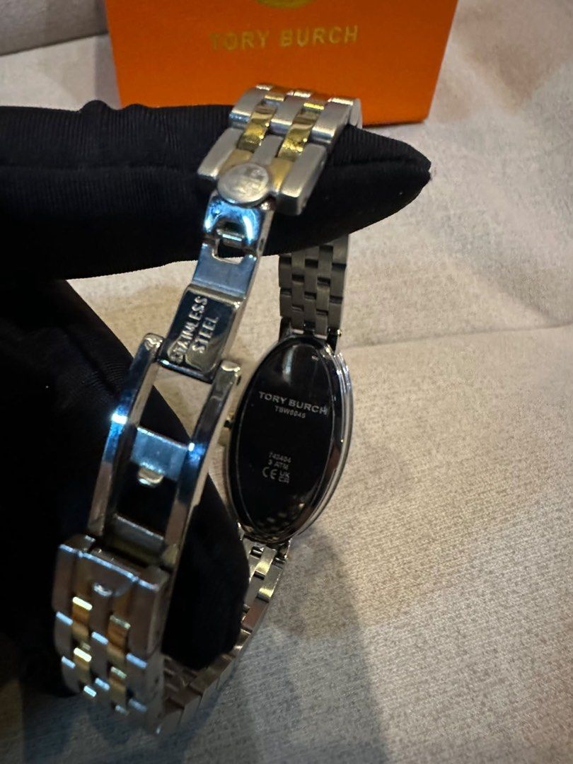 Original Tory Burch Oval Watch (Category: Women's Watches) located in Cavite. Submitted by rubieanne__ (Listing ID 1464588682, Image 3). Description: riginal tory burch two tone oval watch excellent brand new condition complete links and inclusions ₱27,800 srp selling low ₱4,500 pawnable moneyback guranteed.