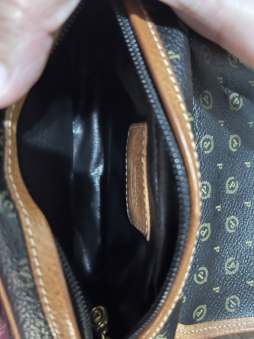Original Vintage Pollini Monogram Sling bag (Category: Cross-body Bags) located in Taguig. Submitted by collectionsbykhrisna (Listing ID 1464645402, Image 3). Description: For Collectors (still negotiable) Original Pollini monogram sling bag from ITALY Classic Monogram pattern Adjustable sling strap Gold tone hardware.