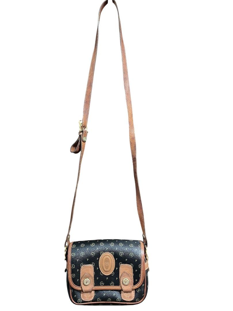 Original Vintage Pollini Monogram Sling bag (Category: Cross-body Bags) located in Taguig. Submitted by collectionsbykhrisna (Listing ID 1464645402, Image 1). Description: For Collectors (still negotiable) Original Pollini monogram sling bag from ITALY Classic Monogram pattern Adjustable sling strap Gold tone hardware.