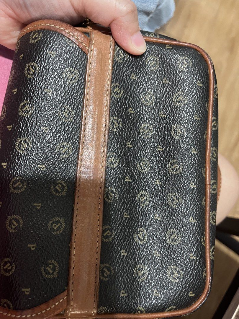 Original Vintage Pollini Monogram Sling bag (Category: Cross-body Bags) located in Taguig. Submitted by collectionsbykhrisna (Listing ID 1464645402, Image 2). Description: For Collectors (still negotiable) Original Pollini monogram sling bag from ITALY Classic Monogram pattern Adjustable sling strap Gold tone hardware.