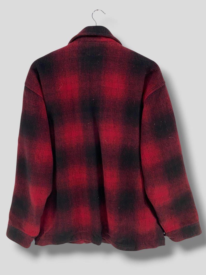 OshKosh B'gosh Red Plaid Zip-Up Jacket (Category: Coats, Jackets and Outerwear) located in General Santos City (Dadiangas). Submitted by thiftnibadi3 (Listing ID 1464642543, Image 2). Description: - Classic red and black plaid OshKosh B'gosh jacket - Zip-up front with a collar - Two side pockets and one small zippered chest pocket - Lined interior for extra warmth - Durable and perfect for layering.