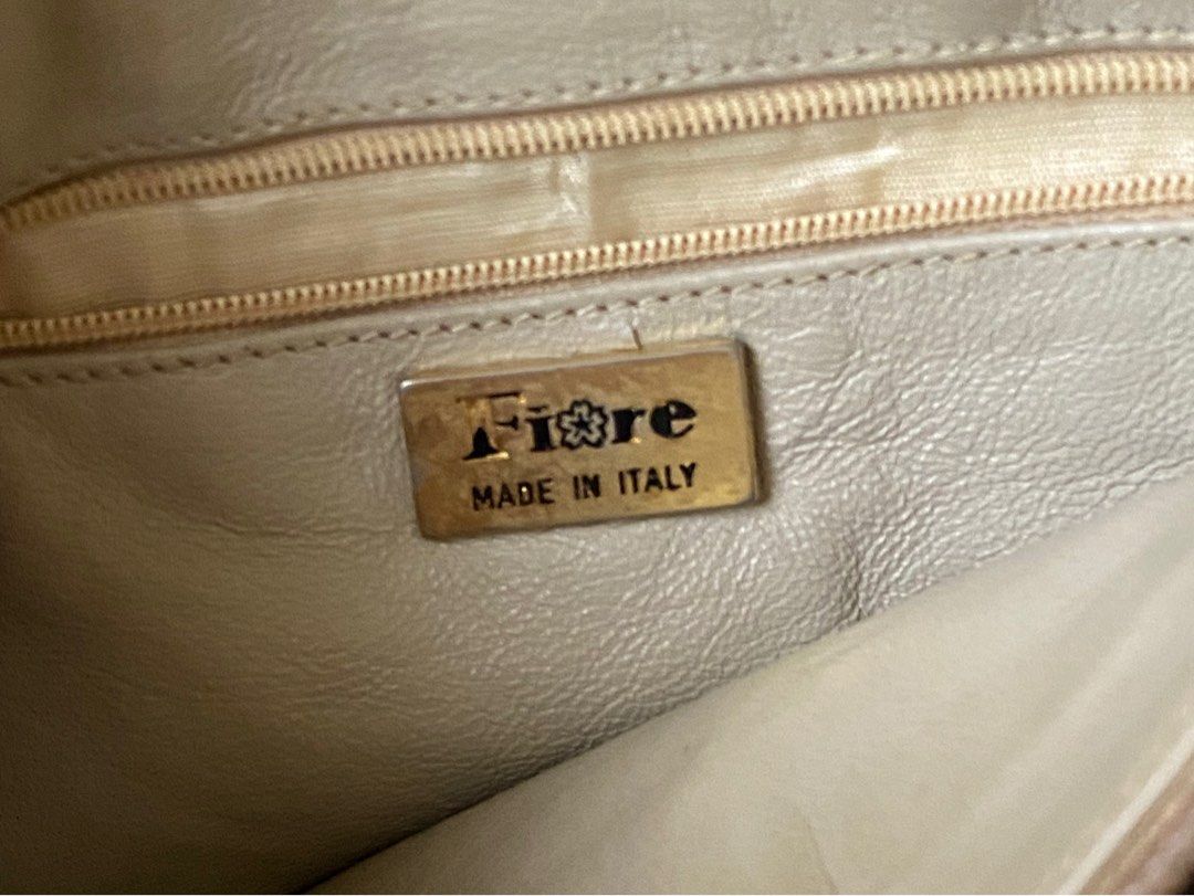 ostrich leather cream bag (Category: Shoulder Bags) located in Caloocan City. Submitted by v6nnies (Listing ID 1464629251, Image 3). Description: ostrich leather cream bag fiore made in italy 20x28 cm got this on ig from a bidding so so hard to let go but i just don't reach for it anymore 🥹 i think it needs a bit of cleaning but the inside is ok pa naman :) .