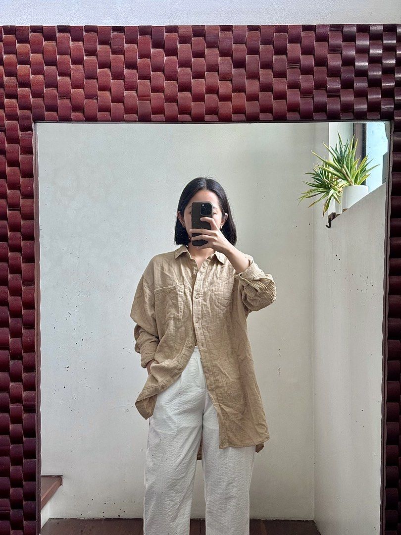 Cotton On Oversized Beige Cotton Blend Button-Up Shirt (Category: Longsleeves) located in Bulacan. Submitted by _arislmt (Listing ID 1464586162, Image 2). Description: - Comfortable oversized fit - Chest pocket - Button-up front - Ideal for casual wear - Versatile styling options - Loose and relaxed vibe - Best fits M-L .