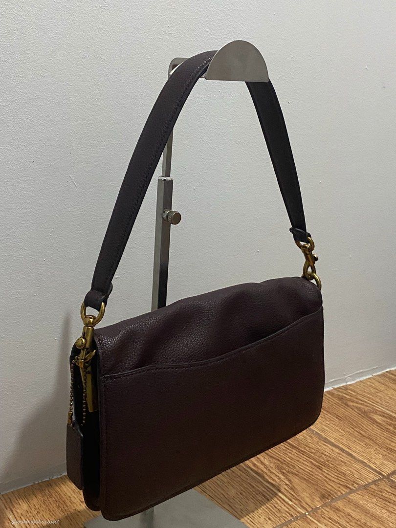 OXBLOOD SHOULDER BAG (Category: Shoulder Bags) located in Davao. Submitted by ccfinds_ph (Listing ID 1464694022, Image 2). Description: Condition: Rank B - Good. Moderately used with visible wear. Has visible tarnish/patina on zipper puller, zipper teeth, and O-ring hardware. Leather is clean, structured, and has no major scuffs. Magnetic flap with C turnlock closure. Detachable shoulder strap. Spacious for wallet, phone, and essentials. *Selling