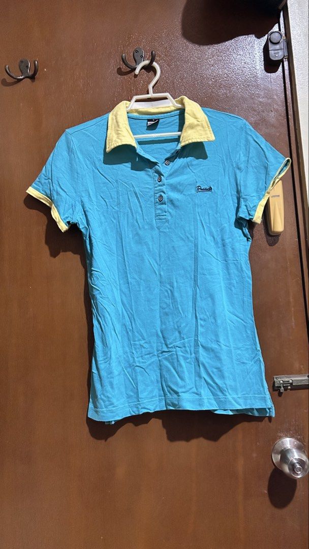Paddock's Blue and Yellow Polo Shirt (Category: Shirts) located in Cabuyao City. Submitted by pickedbyarya (Listing ID 1464749251, Image 1). Description: Size M W 14 x 23.5 in Di super nasuot Maganda tela - Brand: Paddock - Size: Medium - Color: Blue with bright yellow collar and sleeve trim - Material: Cotton, relaxed everyday fit - Details: 3-button placket, small embroidered logo on chest.