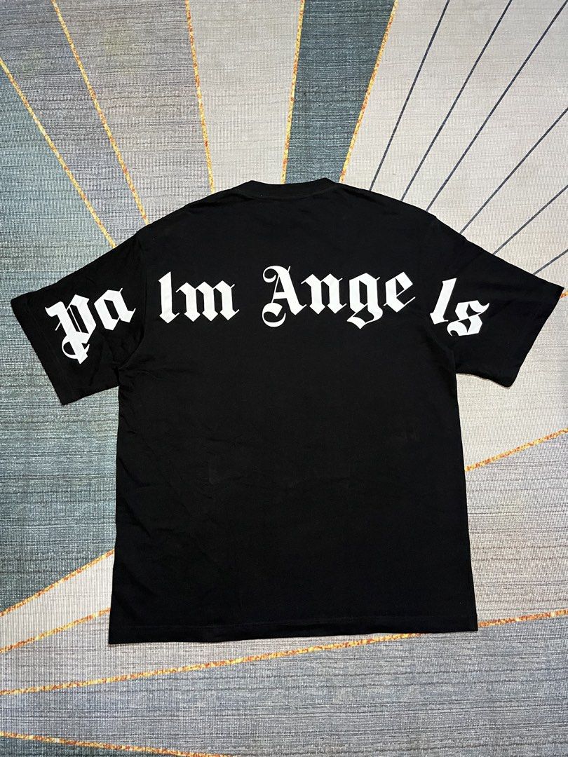 Palm Angels Black T-Shirt Size S (Category: Tshirts & Polo Shirts ) located in Puerto Princesa. Submitted by dijaydj28 (Listing ID 1464589286, Image 1). Description: - Brand: Palm Angels - Color: Black - Size: S - Material: 100% Cotton - Features: Classic gothic logo on back and neck - Condition: Great staple piece.