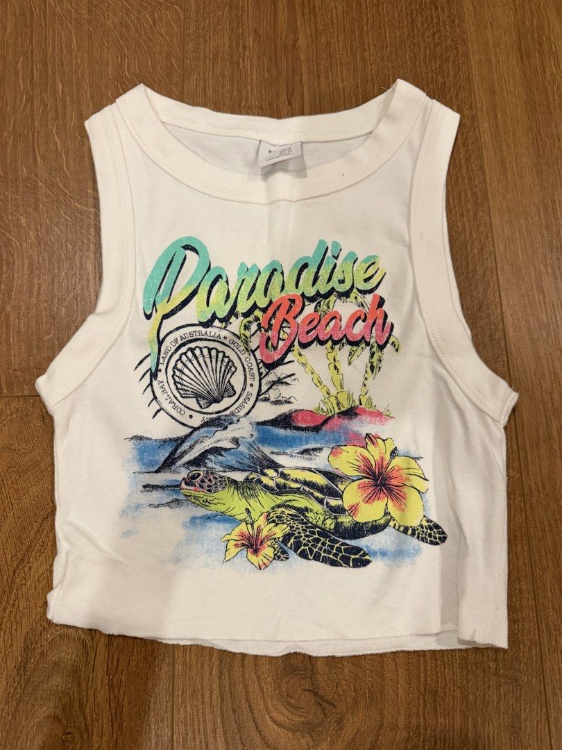 Paradise Beach top (Category: Shirts) located in Paranaque City. Submitted by bbyooodaa (Listing ID 1464631785, Image 1). Description: Super cute for the beach 🏖️ Can be worn as a cover up or a top! Cropped! .