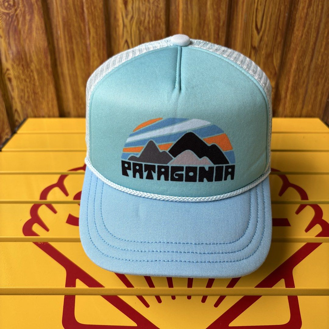 Patagonia Trucker Hat Cap Light Blue Mesh (Category: Caps & Hats) located in Dapitan. Submitted by payt3es_thrift. (Listing ID 1464601645, Image 1). Description: - Patagonia trucker cap - Light blue color with mesh back - Classic Patagonia mountain logo on front - Rope detail above brim - Adjustable snapback closure - Ideal for sunny days and casual wear.