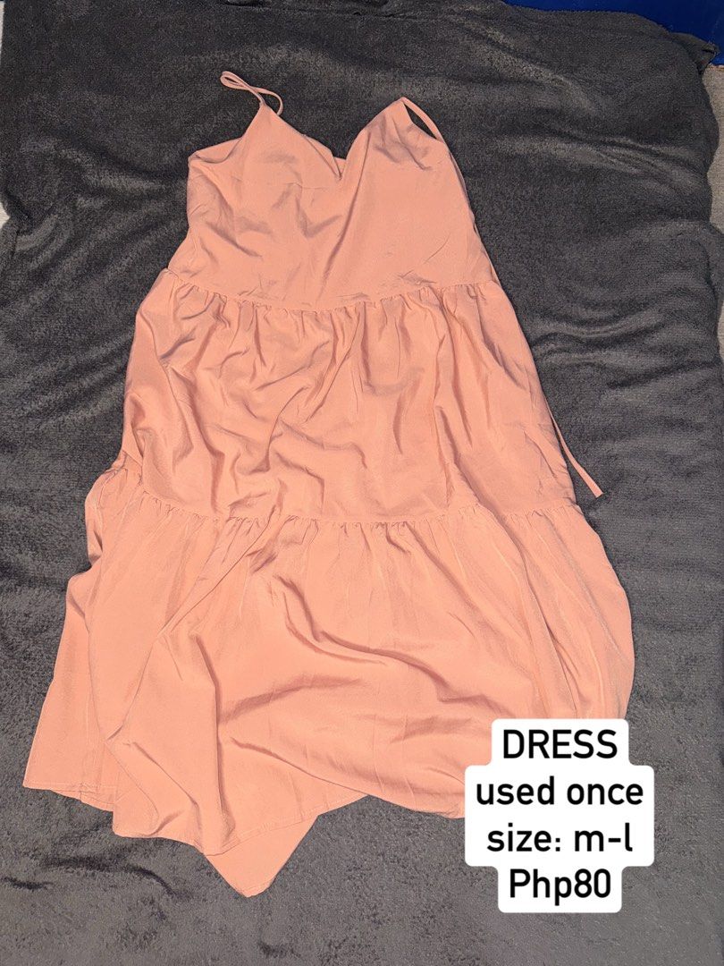 Peach Tiered Midi Dress (Category: Dresses) located in Manila. Submitted by gieanne.222 (Listing ID 1464626905, Image 1). Description: - Peach tiered midi dress - Spaghetti straps & V-neckline - Fits size Medium to Large - Worn only once - Ideal for casual outings or beach days - Lightweight and flowy material.