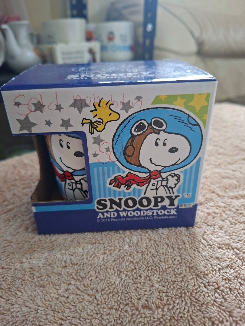 Peanuts Snoopy and Woodstock Ceramic Mug (Category: Coffee & Tea Tableware) located in Consolacion. Submitted by luxekerei (Listing ID 1464769277, Image 1). Description: - Peanuts Snoopy and Woodstock ceramic mug set box featuring an astronaut-themed design from the © 2015 Peanuts Worldwide collection..