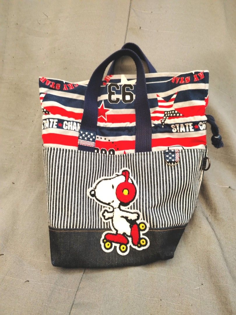 Peanuts Snoopy Blue Red Stripes Tote Bag (Category: Tote Bags) located in San Fernando. Submitted by jpmarketplace2023 (Listing ID 1464736397, Image 1). Description: 💚 All items are authentic from Japan. 💛 MOP: GCash (❌️ GCash Protect) 🩵 MOD: LBC only (❌️ S. Checkout, COD, COP) 💙 Meet-up: Vista Mall, San Fernando, Pampanga 💜 All items are on-hand. 🧡 First to pay gets the item first. ❤️ Breakable items are packed with care and caution. Selle