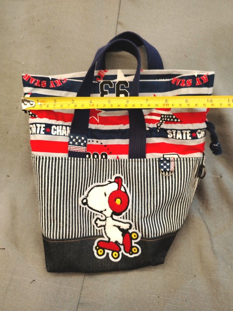 Peanuts Snoopy Blue Red Stripes Tote Bag (Category: Tote Bags) located in San Fernando. Submitted by jpmarketplace2023 (Listing ID 1464736397, Image 3). Description: 💚 All items are authentic from Japan. 💛 MOP: GCash (❌️ GCash Protect) 🩵 MOD: LBC only (❌️ S. Checkout, COD, COP) 💙 Meet-up: Vista Mall, San Fernando, Pampanga 💜 All items are on-hand. 🧡 First to pay gets the item first. ❤️ Breakable items are packed with care and caution. Selle
