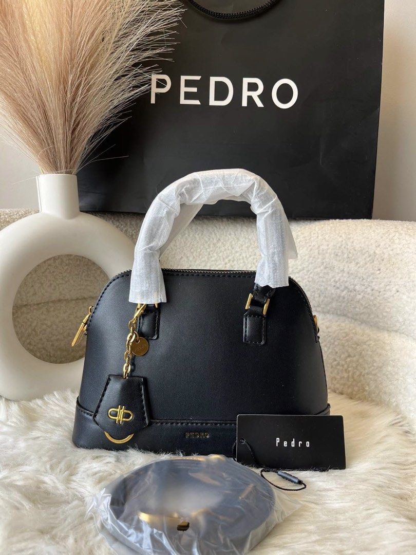 Pedro Hand and Sling Bag - Black (Category: Cross-body Bags) located in Pasig City. Submitted by preloved.closet2 (Listing ID 1464764155, Image 1). Description: With Sling strap Color Black Add paperbag plus 80.