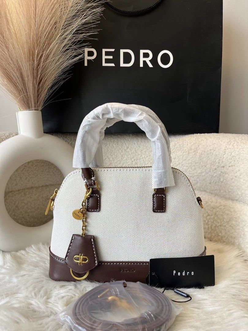 Pedro Hand and Sling Bag- Canvas 2tone (Category: Cross-body Bags) located in Pasig City. Submitted by preloved.closet2 (Listing ID 1464764271, Image 1). Description: With Sling Strap Color Canvas and Brown 2tone Add paperbag plus 80.