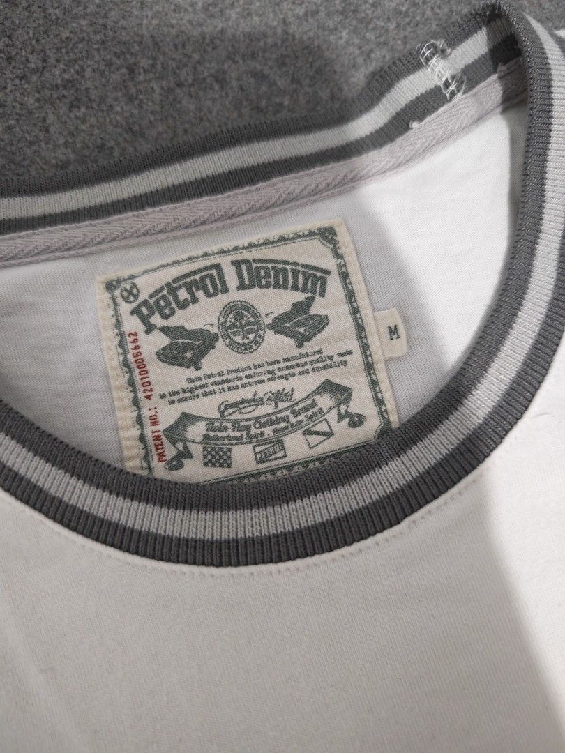 Petrol Denim T-Shirt Bundle | Size M (Category: Tshirts & Polo Shirts ) located in Manila. Submitted by goku_doggo (Listing ID 1464696782, Image 3). Description: - Brand: Petrol Denim - Size: M - Bundle of 2 tees (White with striped collar/chest logo, and Heather Orange with box logo/hem patch) - Get them both for 500 - Material: Soft cotton blend with interior brand and care labels - Condition: Great casual everyday wear.