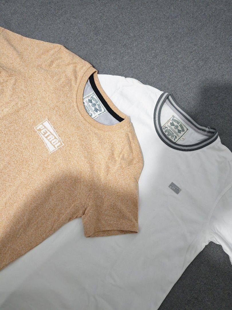 Petrol Denim T-Shirt Bundle | Size M (Category: Tshirts & Polo Shirts ) located in Manila. Submitted by goku_doggo (Listing ID 1464696782, Image 1). Description: - Brand: Petrol Denim - Size: M - Bundle of 2 tees (White with striped collar/chest logo, and Heather Orange with box logo/hem patch) - Get them both for 500 - Material: Soft cotton blend with interior brand and care labels - Condition: Great casual everyday wear.