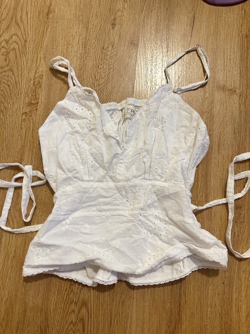 [PHIA THE LABEL] white picnic top (Category: Blouses) located in Cainta. Submitted by m4tchyyy (Listing ID 1464649151, Image 1). Description: 🍀 mode of payment: gcash or bdo 🍀 mode of delivery: j&t express, ggx, or same day delivery within metro manila feel free to inquire! 🩷.