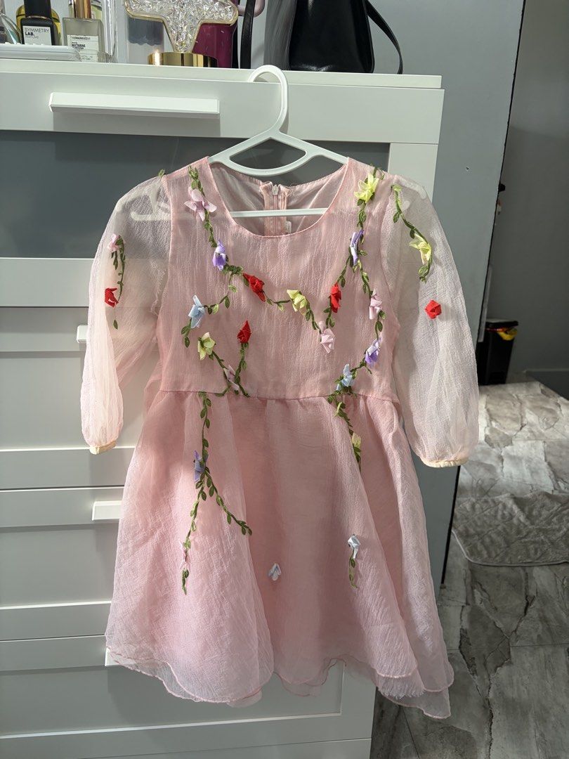 Pink Dress with Flowers (Category: Babies & Kids Fashion) located in Bulacan. Submitted by lenggayy (Listing ID 1464634863, Image 1). Description: - Sweet pink dress - Sheer organza puff sleeves with gathered cuffs - Delicate vine and flower embroidery all over - Perfect for parties and special occasions - Zipper closure at the back.