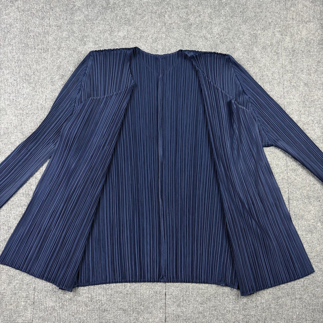 Pleats Please Issey Miyake Cardigan (Category: Luxury Apparel) located in Manila. Submitted by yourtherapist_ (Listing ID 1464709535, Image 1). Description: Pleats Please Issey Miyake Cardigan Size: 4 Condition: Excellent Material: 100% Polyester Made in: Japan Measurements Width: Open Length: 25 Sleeve: 24 5,000.