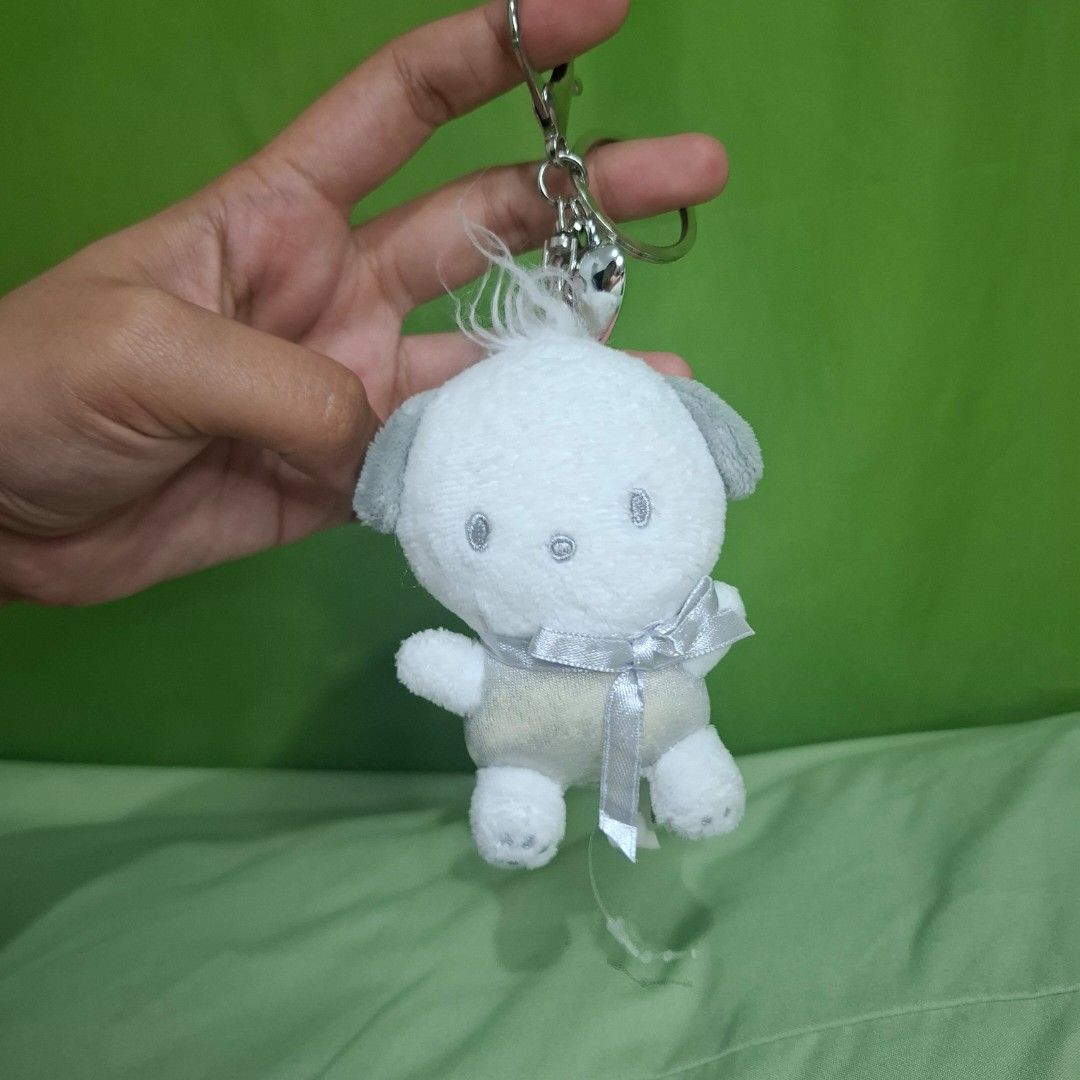 Pochaco charm (Category: Plushies & Soft Toys) located in Adams. Submitted by frog_and_clover (Listing ID 1464705480, Image 1). Description: original sanrio silver pochaco charm. faded silver colored clothes. still in good condition beside the faded color.
