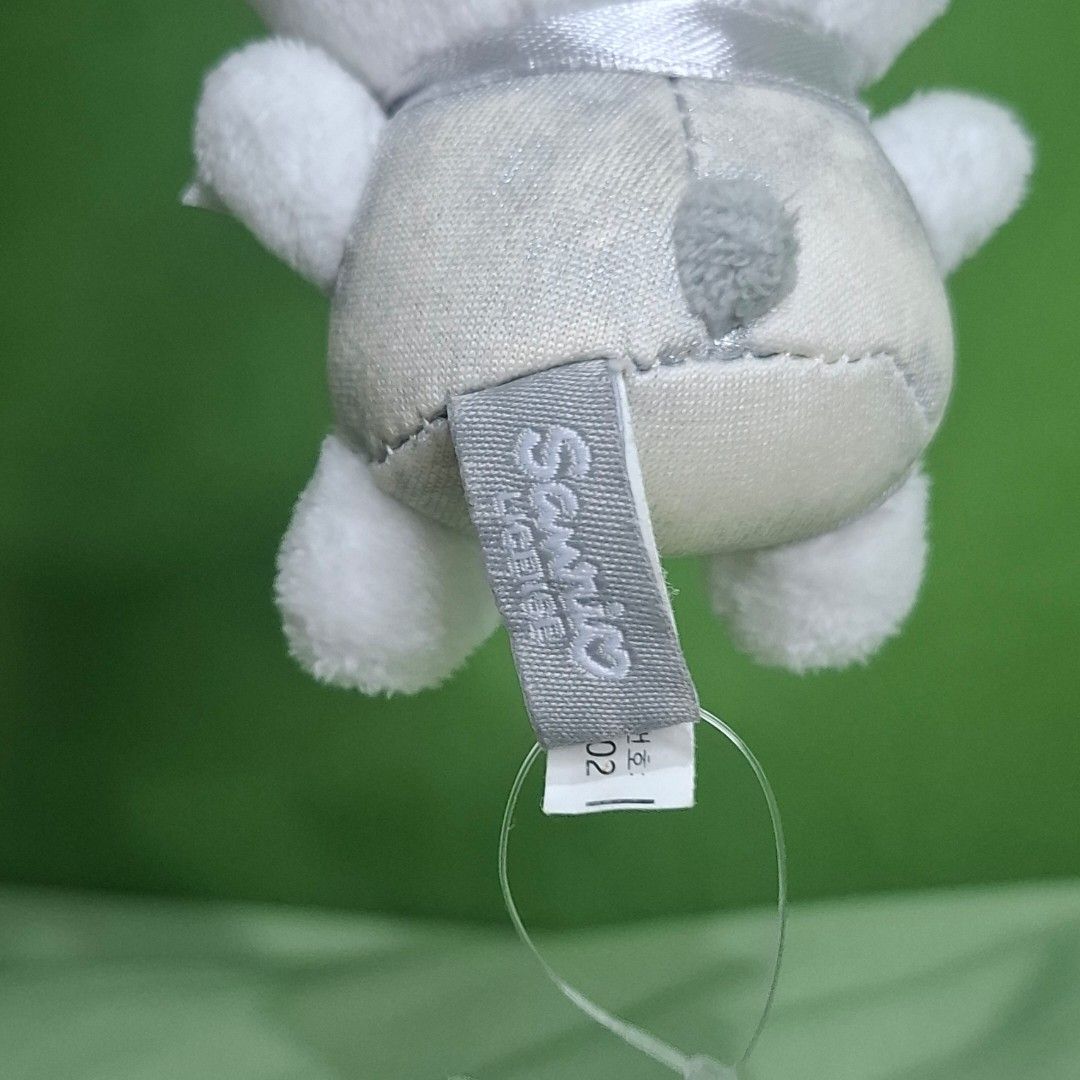 Pochaco charm (Category: Plushies & Soft Toys) located in Adams. Submitted by frog_and_clover (Listing ID 1464705480, Image 3). Description: original sanrio silver pochaco charm. faded silver colored clothes. still in good condition beside the faded color.