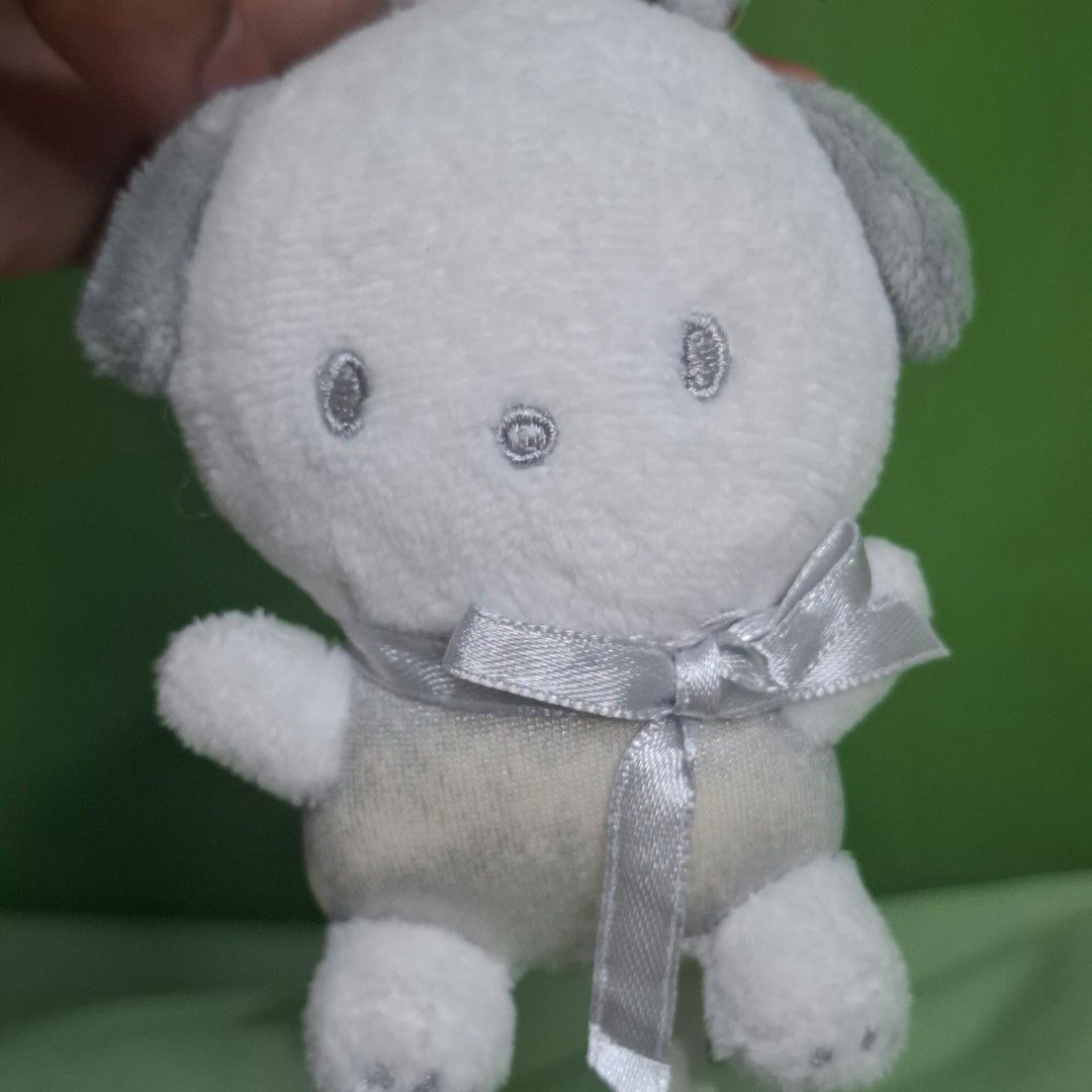 Pochaco charm (Category: Plushies & Soft Toys) located in Adams. Submitted by frog_and_clover (Listing ID 1464705480, Image 2). Description: original sanrio silver pochaco charm. faded silver colored clothes. still in good condition beside the faded color.