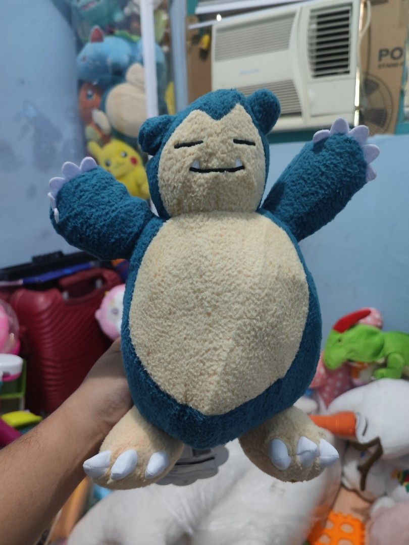 Pokemon Snorlax Plush Toy (Category: Plushies & Soft Toys) located in Iligan City. Submitted by sneakymagician (Listing ID 1464590486, Image 1). Description: - Adorable Snorlax plushie - Made with soft and cuddly material - Ideal for any Pokemon fan - Great for display or playtime - Approximately 10 inches tall -with Papertag.