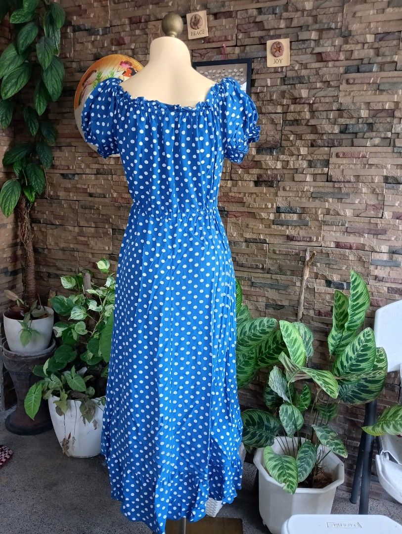 Polka Dress (Category: Dresses) located in Rizal. Submitted by timeless_shop (Listing ID 1464603681, Image 3). Description: Polka Dot Dress - Blue with White Dots 📏 Length: 46 inches - Midi / Maxi 📏 Bust: 36-38 inches paikot - kasya M-L frame 📏 Waist: 28-33 inches - garterized + may tali with tassel, adjustable! 👗 Size: Medium to Large 🎨 Color: Royal Blue with white polka dots - ang ganda! ✂️ Style: Puff sleeves, off-shoulder / square neck, 