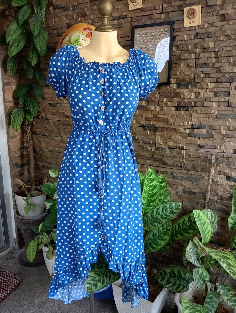 Polka Dress (Category: Dresses) located in Rizal. Submitted by timeless_shop (Listing ID 1464603681, Image 2). Description: Polka Dot Dress - Blue with White Dots 📏 Length: 46 inches - Midi / Maxi 📏 Bust: 36-38 inches paikot - kasya M-L frame 📏 Waist: 28-33 inches - garterized + may tali with tassel, adjustable! 👗 Size: Medium to Large 🎨 Color: Royal Blue with white polka dots - ang ganda! ✂️ Style: Puff sleeves, off-shoulder / square neck, 