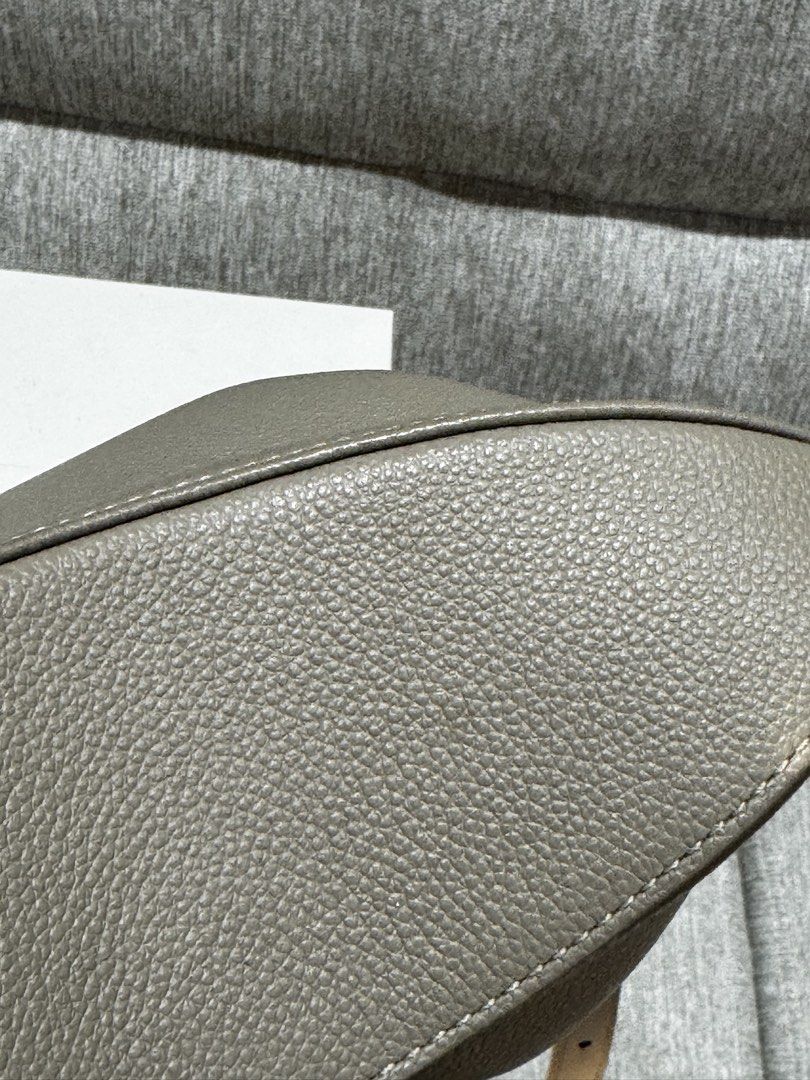 Polène Tonca Bag Taupe Grained Leather (Category: Luxury Bags & Wallets) located in Pateros City. Submitted by lmnsi (Listing ID 1464648839, Image 2). Description: Polène Tonca Bag – Taupe * Color: Taupe * Material: Grained Leather * Condition: Like new, barely used * Includes: Original dust bag and box * Reason for Selling: Too many bags 🥹 Note on condition: There are two very small, faint watermarks near the top opening of the bag. They are ba