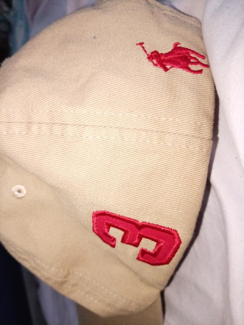 Polo Ralph Lauren Beige Embroidered Baseball Cap (Category: Coats, Jackets and Outerwear) located in Manila. Submitted by emmanueljocars_globalreseller (Listing ID 1464643197, Image 2). Description: Beige Polo Ralph Lauren cap featuring colorful embroidered polo player designs on the front. Classic style with an adjustable strap, perfect for everyday wear and casual outfits. .