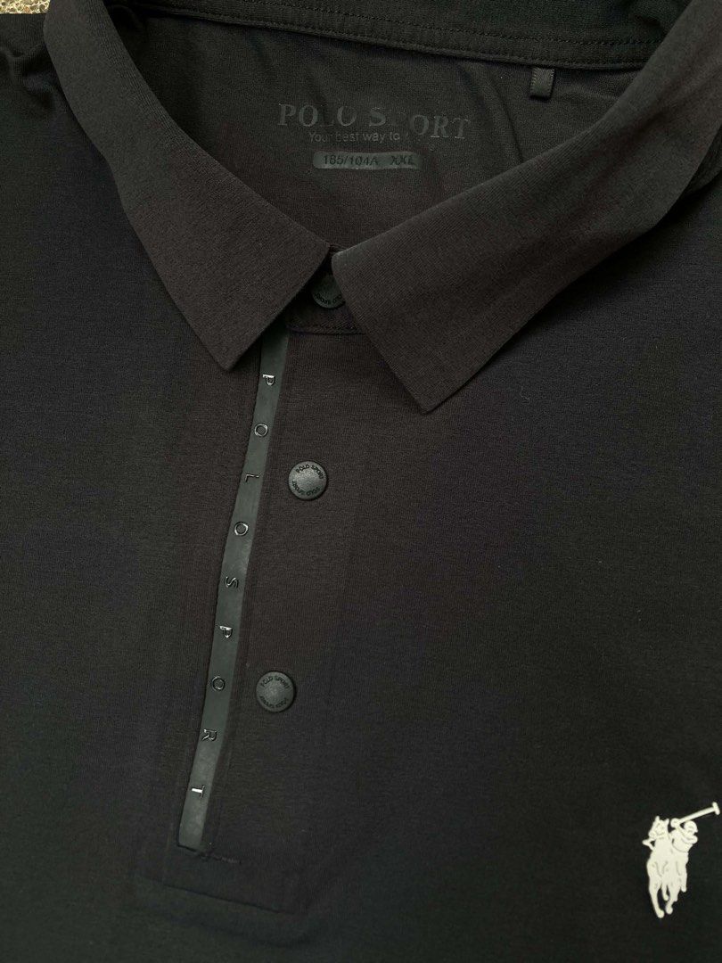 POLO SPORT (Category: Luxury Apparel) located in Dapitan. Submitted by thrift_archive2026 (Listing ID 1464636719, Image 2). Description: -Classic fold-down polo collar with a modern, sleek taped button placket. Custom engraved buttons reading “POLO SPORT”. SIZE: XXL .