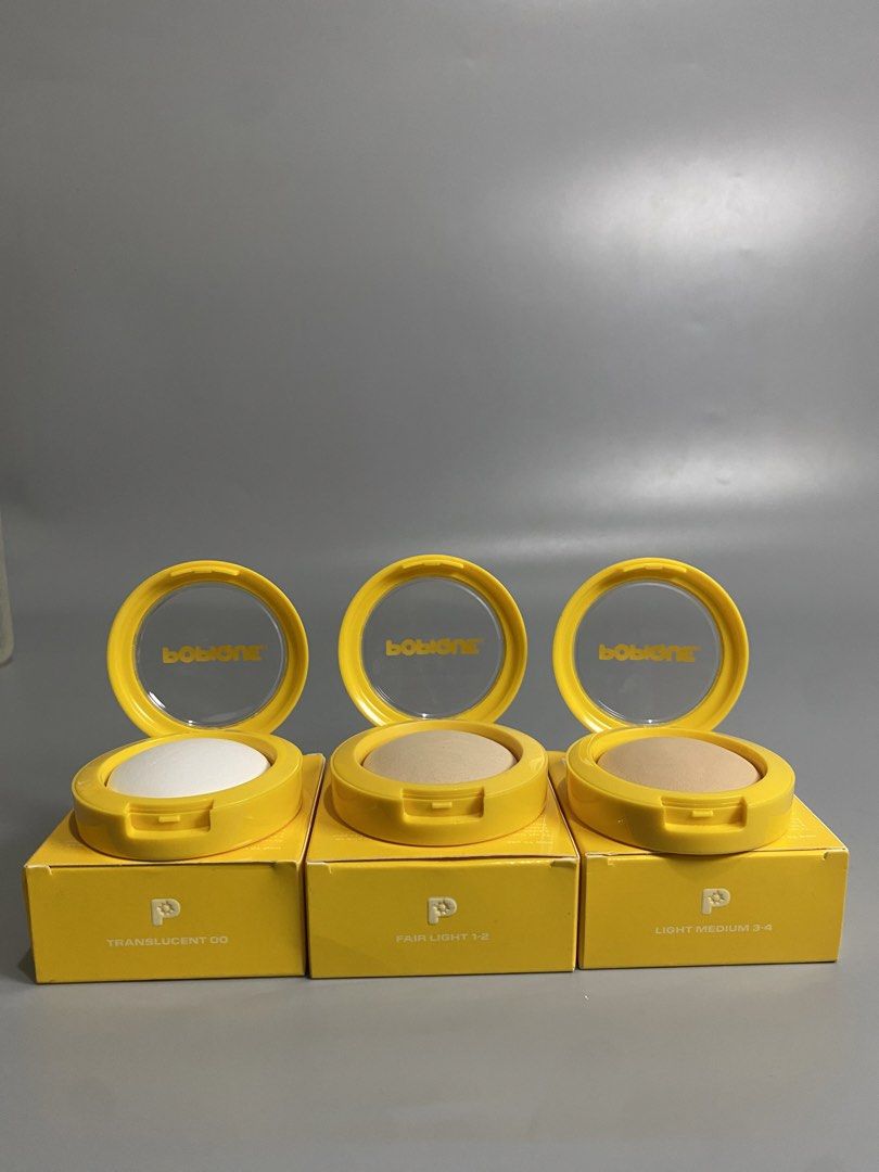 POPIQUE Powder Compacts (Category: Makeup) located in Davao. Submitted by brandedthrift.134 (Listing ID 1464736302, Image 1). Description: - Brand: POPIQUE - Product: Compact setting powder in a bright yellow case with a built-in mirror - Available Shades: Translucent 00, Fair Light 1-2, and Light Medium 3-4 - Perfect for on-the-go touch-ups - Brand new in original matching box.