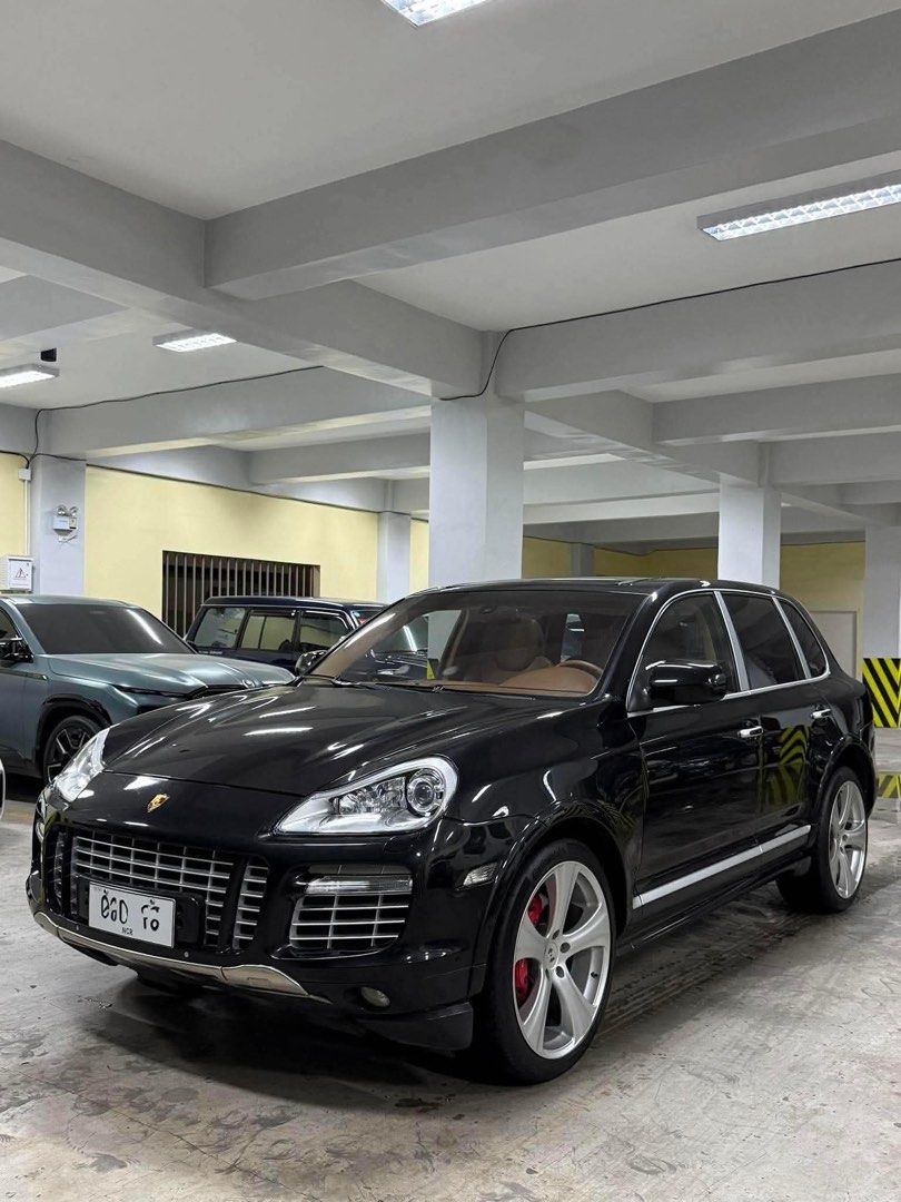 Porsche Cayenne Turbo (957) Auto (Category: Used Cars) located in Manila. Submitted by quality_cars (Listing ID 1464669683, Image 3). Description: 2009 Porsche Cayenne Turbo (957) 4.8L twin-turbocharged V8 Engine 500HP Black Exterior Tan Interior 62K ODO Original Milage Includes 2 keys 3 Ending (Tuesday Coding) Registered 2027 Newly PMS Very Well Maintained Added Factory Options (added cost): - Sports Tailpipes - Stainless Steel Front and Rear Sk