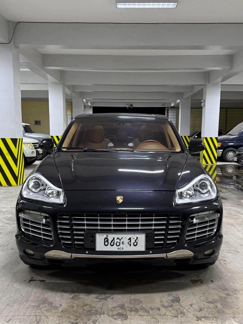 Porsche Cayenne Turbo (957) Auto (Category: Used Cars) located in Manila. Submitted by quality_cars (Listing ID 1464669683, Image 1). Description: 2009 Porsche Cayenne Turbo (957) 4.8L twin-turbocharged V8 Engine 500HP Black Exterior Tan Interior 62K ODO Original Milage Includes 2 keys 3 Ending (Tuesday Coding) Registered 2027 Newly PMS Very Well Maintained Added Factory Options (added cost): - Sports Tailpipes - Stainless Steel Front and Rear Sk