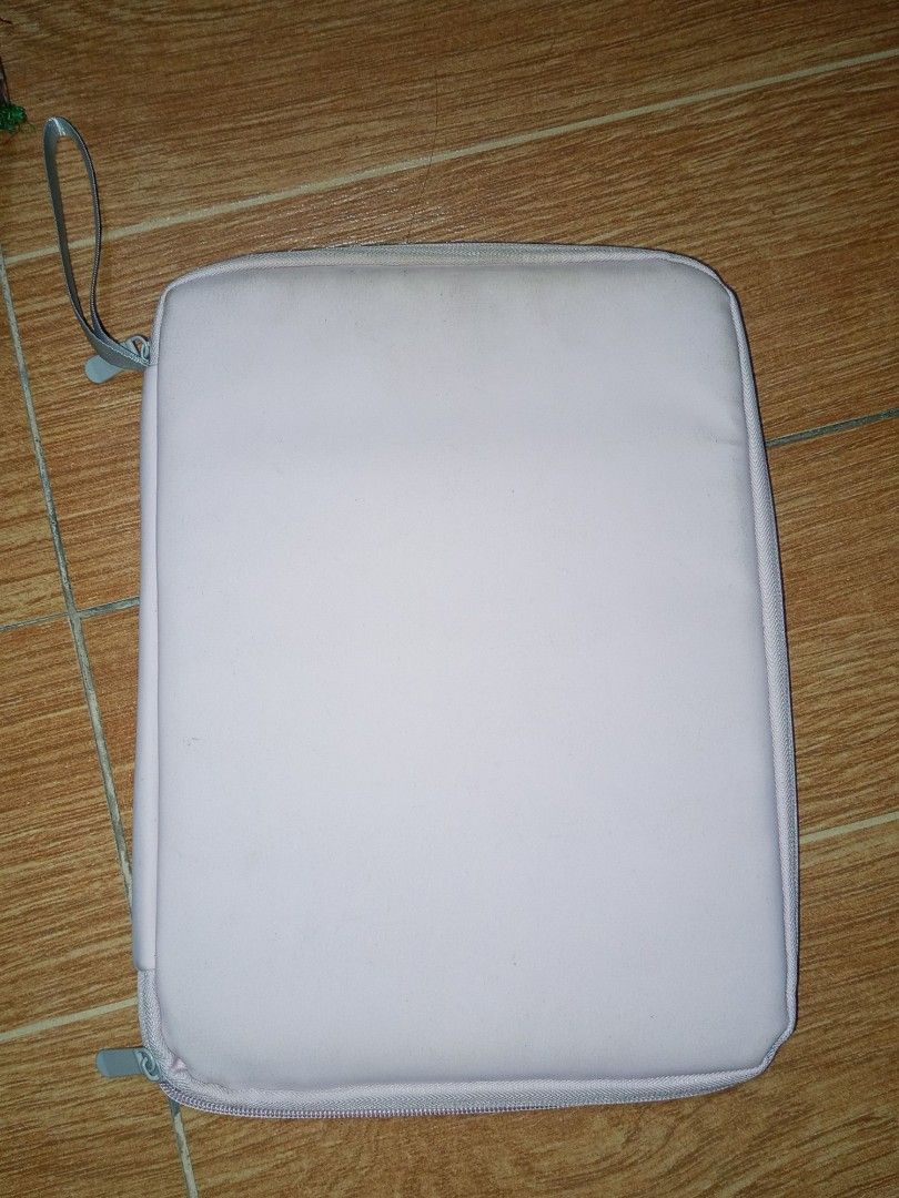 Portable Tablet Bag - Pink (Category: Purses & Pouches) located in Manila. Submitted by aymasaya (Listing ID 1464636459, Image 1). Description: - Chic light pink zippered pouch - Features multiple internal compartments for organization - Ideal for storing small items, travel essentials, or tech accessories - Smooth and reliable zipper closure - Includes a small, convenient loop handle - need wash orig price: 200+ RFS: not using anymore kasi mas l