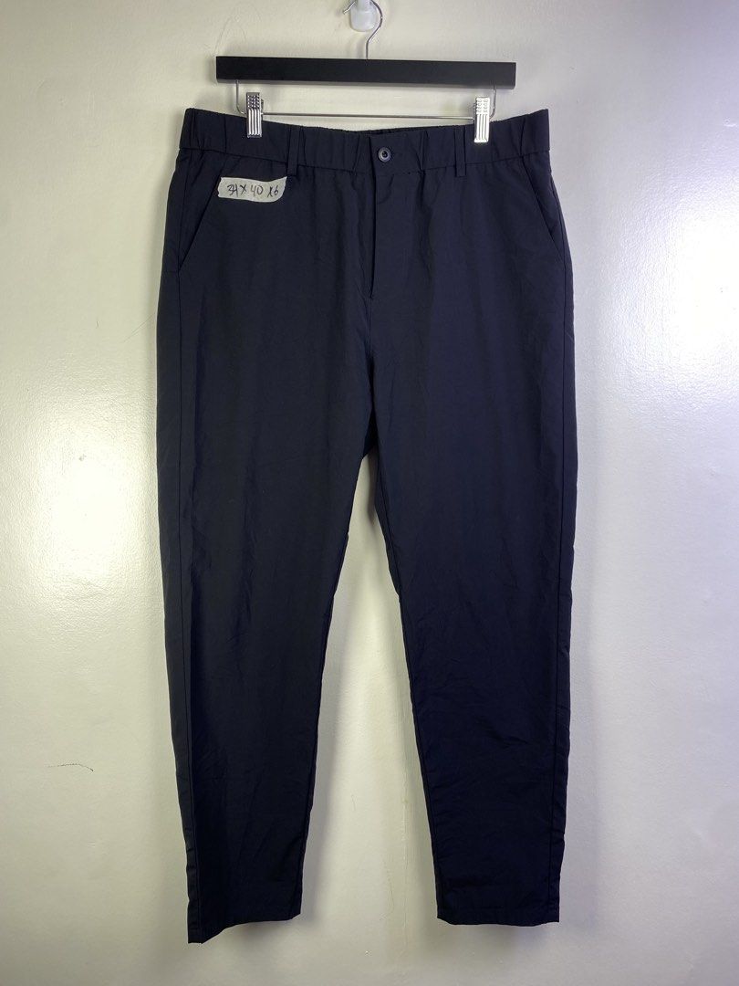 Prada Black Elastic Waist Pants (Category: Jeans) located in Manila. Submitted by declutterpromax (Listing ID 1464601128, Image 1). Description: - Brand: Fashionable - Color: Black - Closure: Elastic waistband with button and zip - Pockets: Two side pockets - Fit: Straight leg - Style: Versatile for casual or dressed-up occasions - Comfort: Comfortable fit.